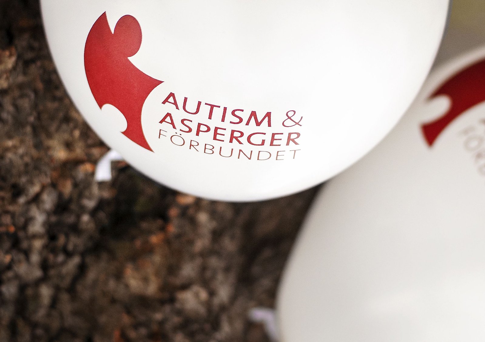 Ballong med Autism- och Aspergerförbundets logga.